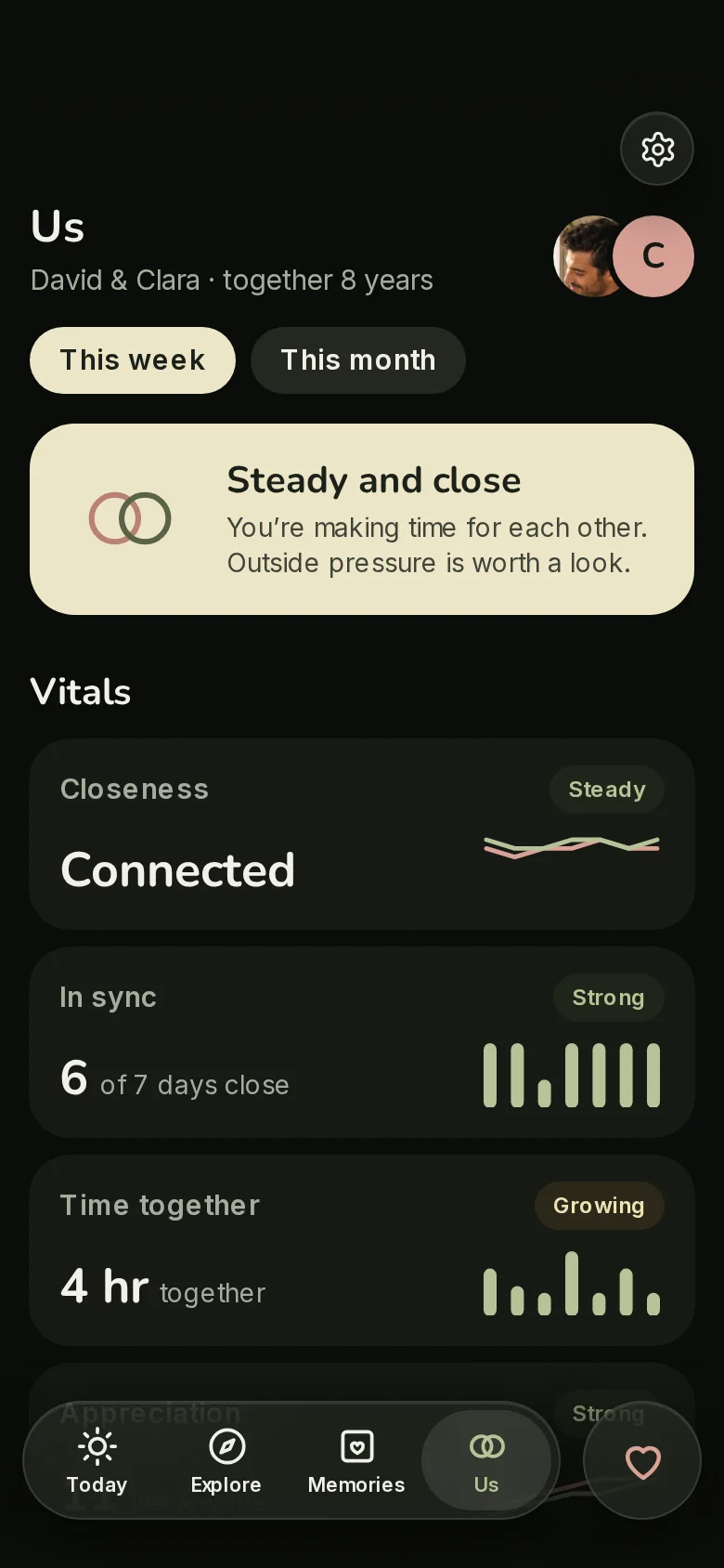 The Us tab in dark mode: a summary and your vitals.